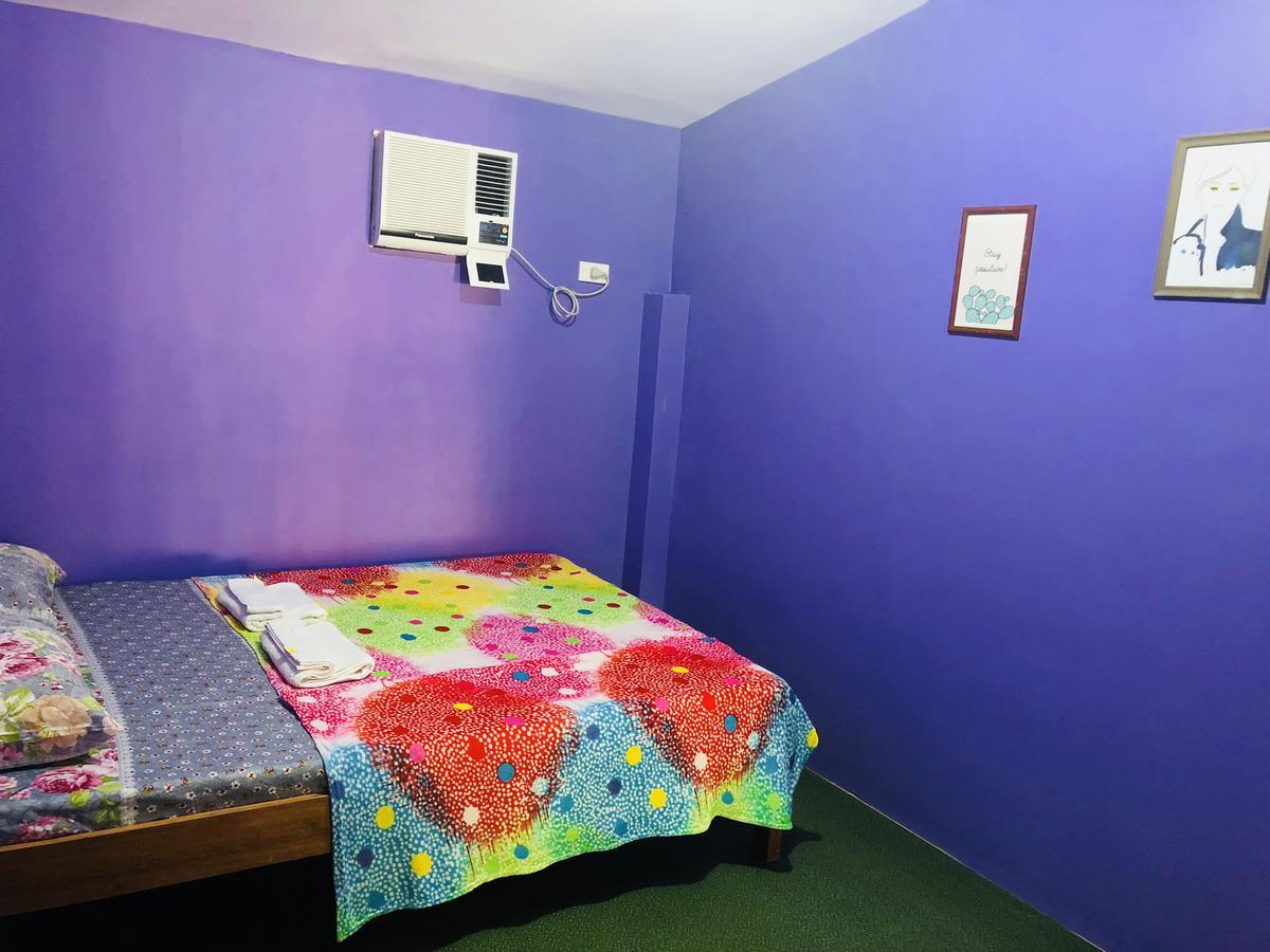 Colors Boutique Hostel Puerto Princesa Bagian luar foto